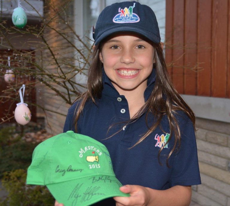 Vanessa at home with one of her Masters souvenirs